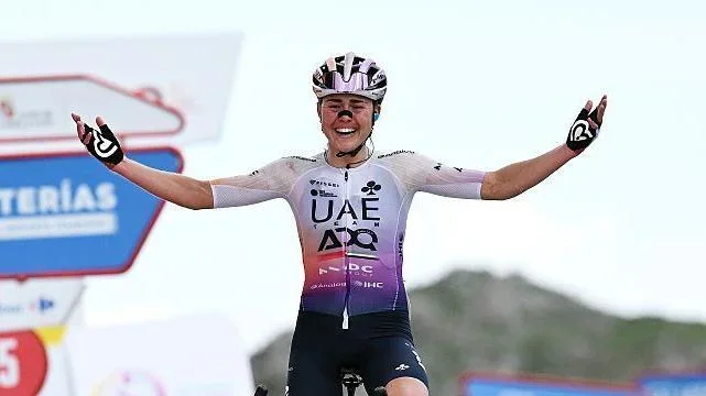 Overall race winner Paula Blasi of Spain and UAE Team ADQ celebrates at finish line